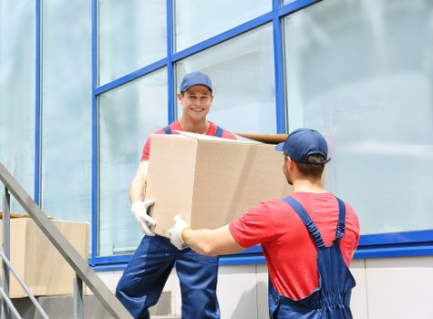 Office removals planning in Westkensington with boxes and workspace setup