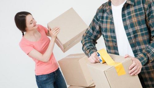 A local moving team organizing belongings for unpacking in a Westkensington property