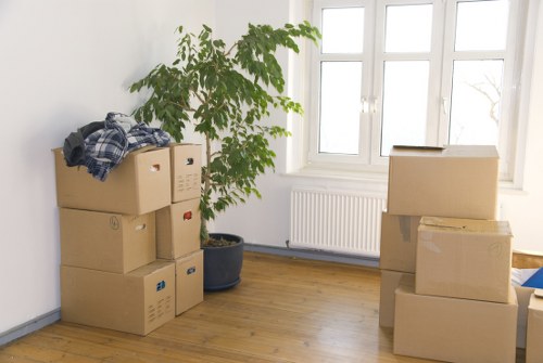Loading furniture for a flat move near West Kensington streets
