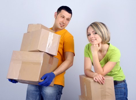 Packed office equipment ready for relocation in Westkensington