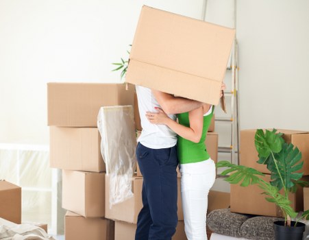Removal van loading items for a move near West Kensington