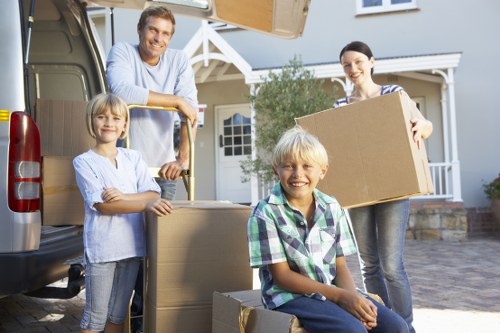 Packing and loading household items into a removals van