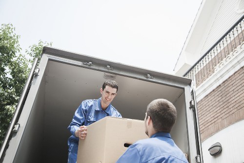 Packed boxes and wrapped furniture ready for local removal
