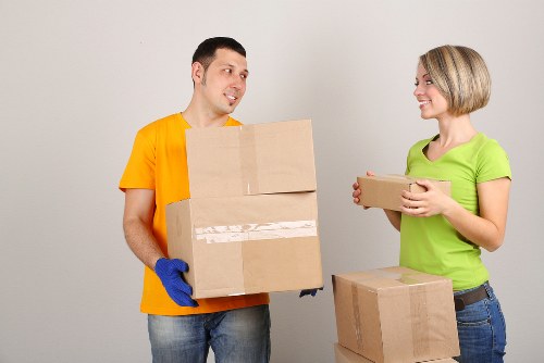 West Kensington house move with boxes and furniture being unloaded